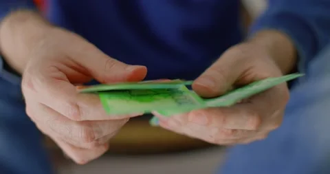 Man holding some paper currency Stock Footage 238768341