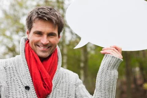 Man holding a speech bubble Stock Photos