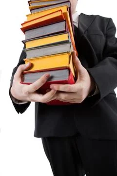 Man holding a stack of books Stock Photos
