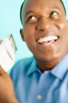 Man holding stack of money Foto stock