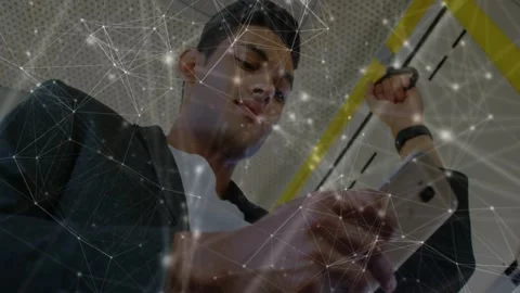 Man holding strap tapping phone on train, animated network nodes overlaying Stock Footage 330161135