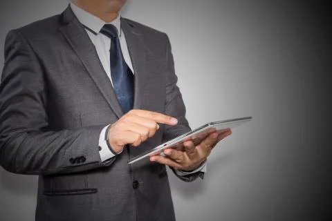 Man holding a tablet computer Stock Photos