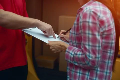 Man holding tablet for delivery signing. Stock Photos