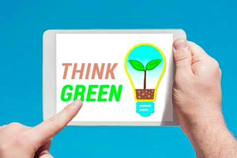 Man holding a tablet device with light bulb eco concept illustration Stock Photos