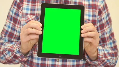 Man holding tablet with green screen Stock Footage 69135158