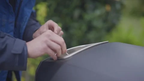 A man is holding a tablet in his hand Stock Footage 297842096