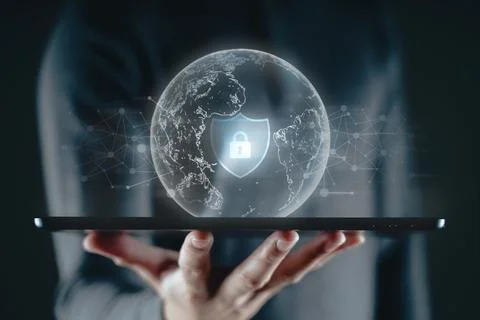 Man holding tablet with padlock shield protects security icon on the virtua.. Stock Photos