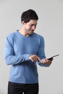 Man holding tablet Stock Photos