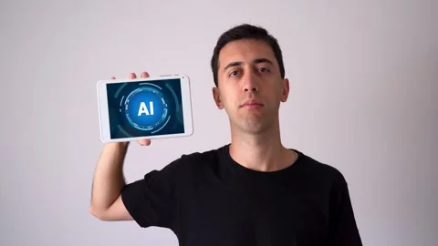 Man holding up a tablet runing with AI software. Concept of replacing workers Stockbeeldmateriaal 304848746