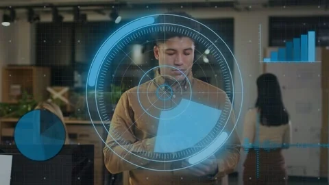 Man holding tablet tapping and swiping in office, causing business UI rotating Stock Footage 334373342