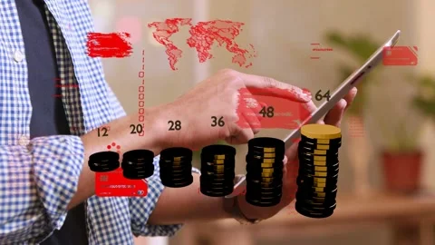 Man holding tablet tapping screen causing coins growing and cards aligning, Stock Footage 340750854