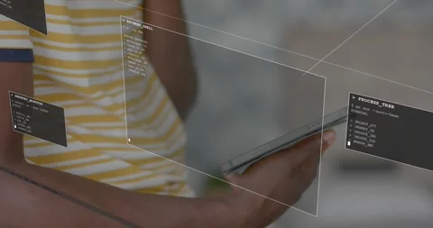 Man holding tablet tapping swiping screen to inspect code in security HUD panels Stock Footage 333899212