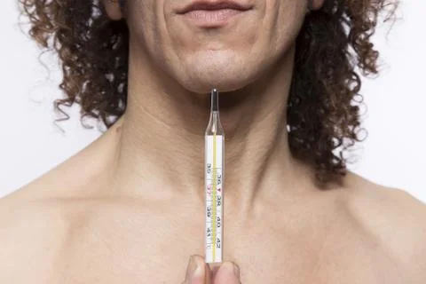 Man holding thermometer Stock Photos