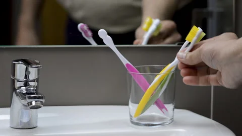 Man holding a toothbrush Stock-Footage 130356627