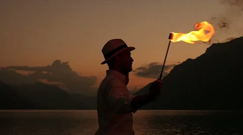 Man holding torchlight in his hand. romantic night light Stock Footage 42944547