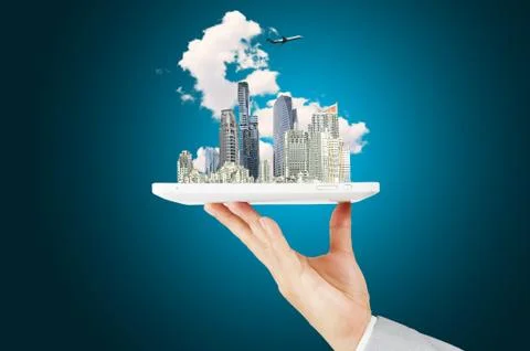 Man holding touch screen tablet and city Stock Photos