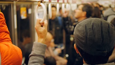 Man Holding Train Handle In The Subway At The Rush Hour. 4K Transport Concept Vidéo 124276715