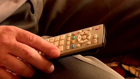 Man holding TV remote. Stock Footage 70492307