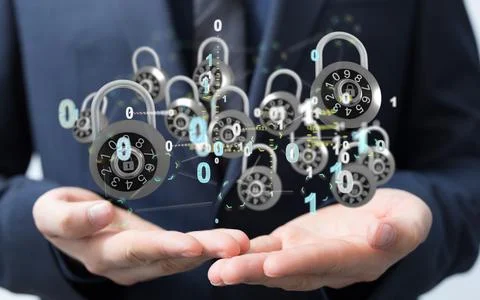 Man holding the virtual 3D padlock icons symbolizing data security Stock Photos