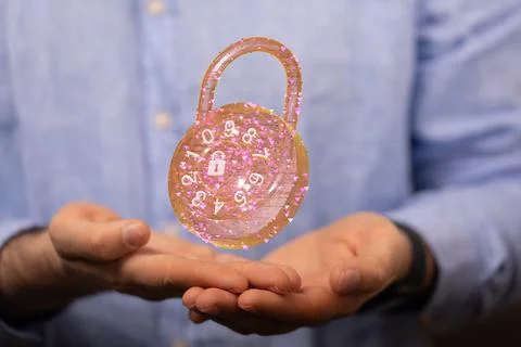 Man holding the virtual 3D padlock icon symbolizing data security Stock Photos