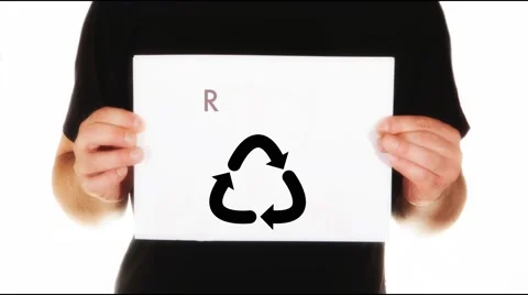 Man holding white message board with text recycling and sign for recycling Stock Footage 45855356