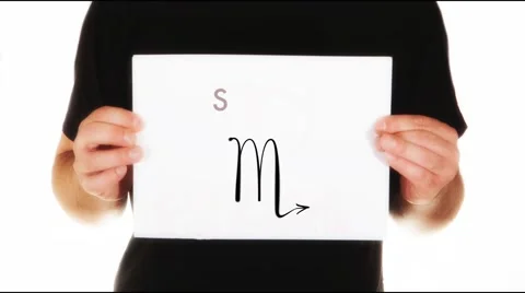Man holding white message board with text scorpio and sign for scorpio Stock Footage 45855392