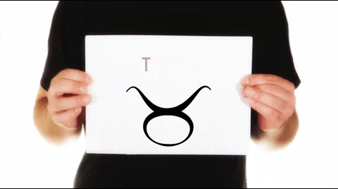 Man holding white message board with zodiac sign for Taurus animated Stock Footage 45855437