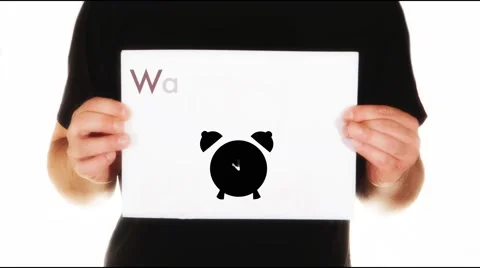 Man holding white message board with animated clock and text wake up dog Stock Footage 45874572