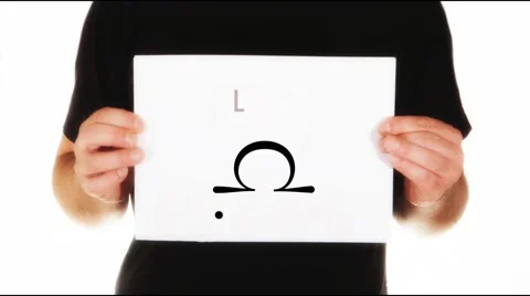 Man holding white paper with libra sign  animation Stock Footage 45855099