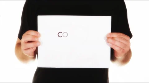 Man holding white paper with text coming soon Stock Footage 45850838