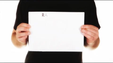 Man holding white paper with text radioactive and animation symbol Stock Footage 45852103