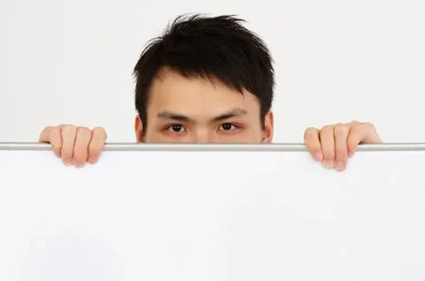 Man holding whiteboard Stock Photos