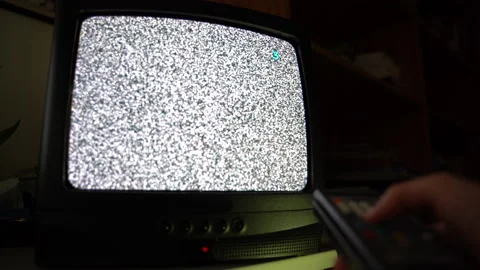 Man holding working remote control and changing channels, TV channels surfing Vidéo 135359159