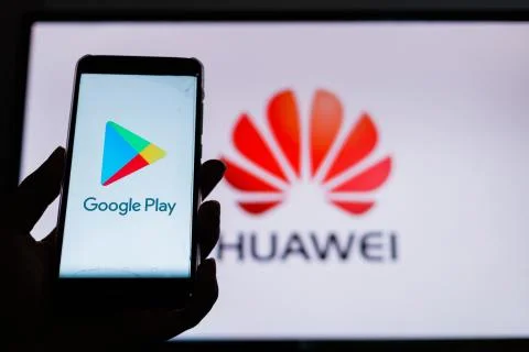 A man holds an android-smartphone Stock Photos