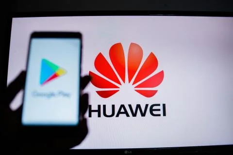 A man holds an android-smartphone Stock Photos