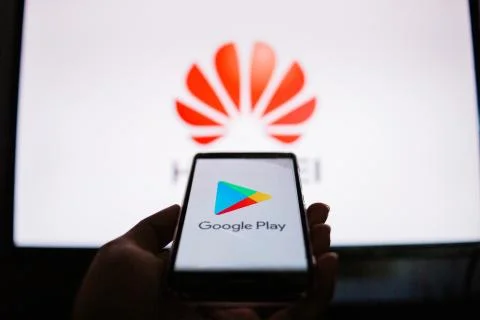 A man holds an android-smartphone Stock Photos