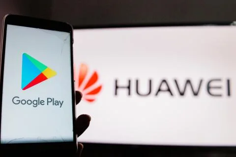 A man holds an android-smartphone Stock Photos