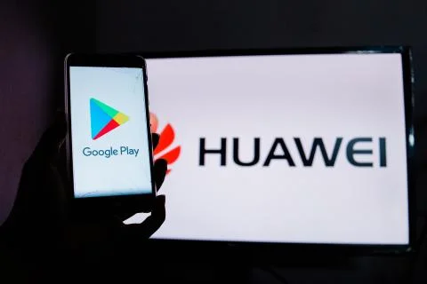 A man holds an android-smartphone Stock Photos