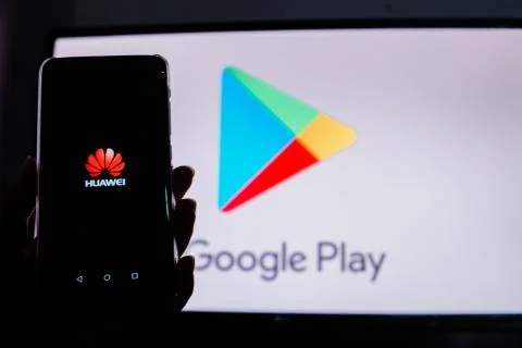 A man holds an android-smartphone Stock Photos