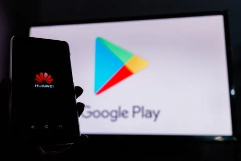 A man holds an android-smartphone Stock Photos