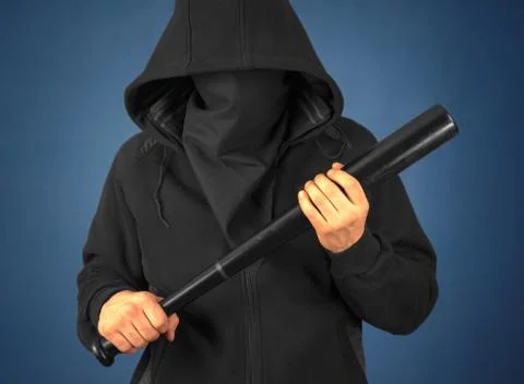Man holds bat Stock Photos