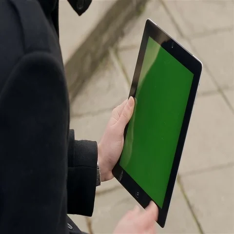 A man holds a blank tablet Stock Footage 69518216