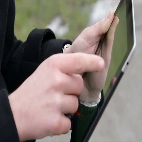 A man holds a blank tablet Stock Footage 69518542