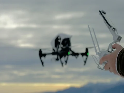 Man holds drone controller 4K Stock Footage 69857002