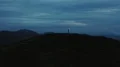 The man holds a firestick in the mountains 4k or 4k+ Resolution