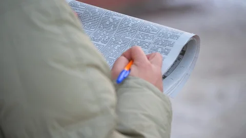  A man holds a newspaper Stock Footage 116771309