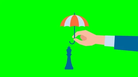 Man holds an open umbrella over a chess piece. Protecting business strategy Stock Footage 323761817