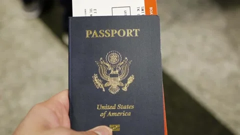 Man holds passport Stock Footage 232872195