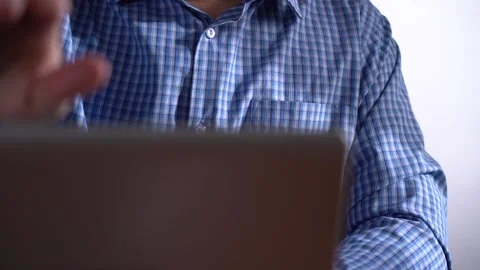 Man Holds Smartphone. Part of the Notebook in the Clip Frame Stock Footage 166996438