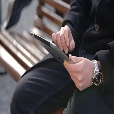 A man holds a tablet Stock Footage 69591762